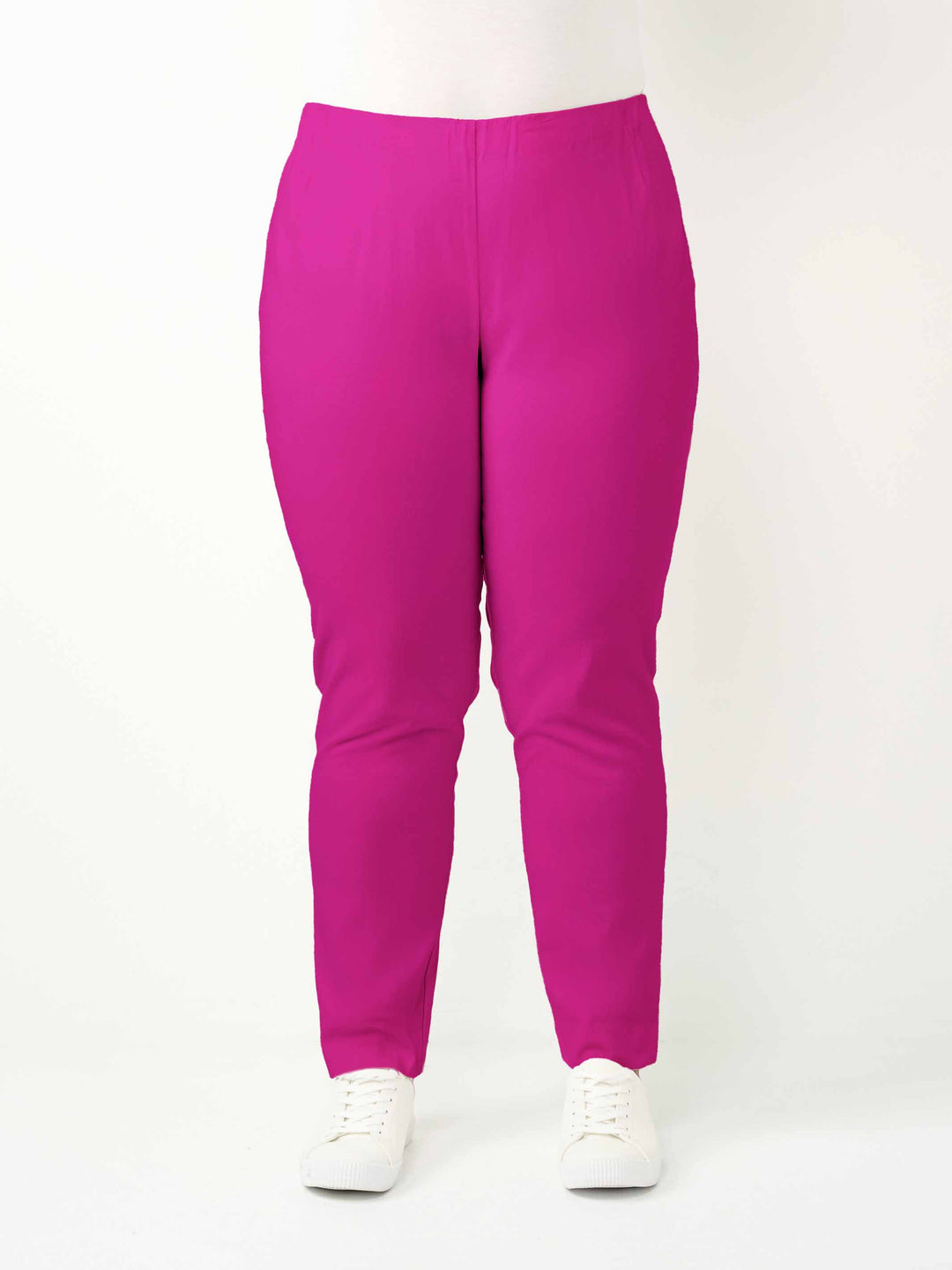 a woman wearing a vibrant hot pink bengaline pant in full length straight leg