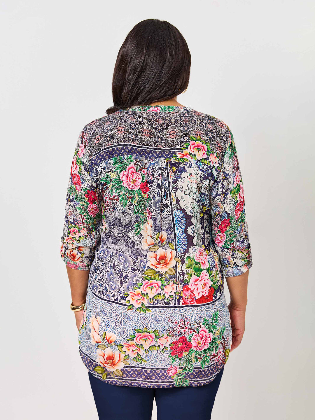 back view of model wearing Lydia floral print nehru collar silky top
