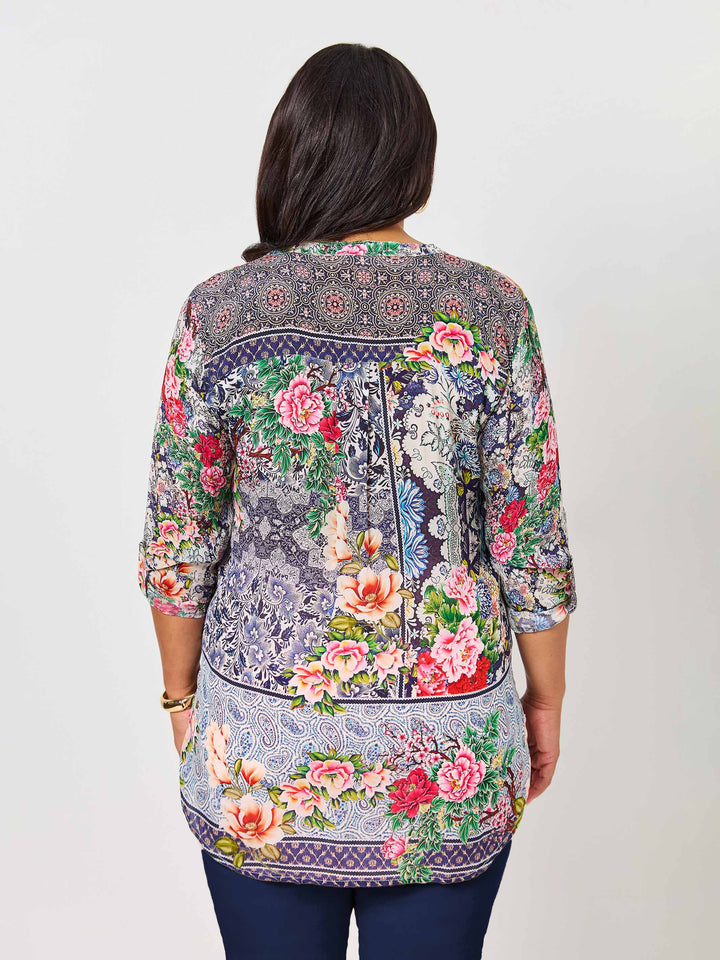 back view of model wearing Lydia floral print nehru collar silky top