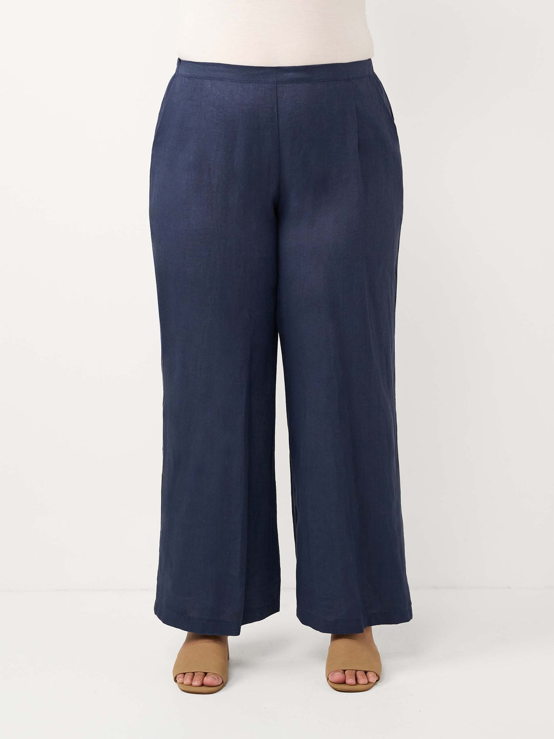 A pair of wide-leg navy blue linen pants