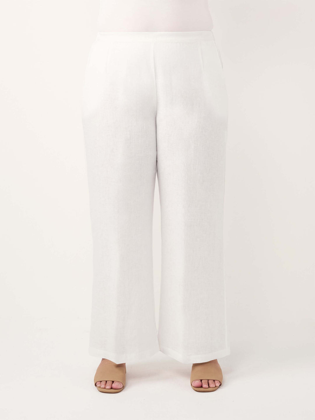 White wide-leg pants shown on a model from the waist down