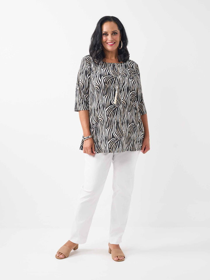 model wearing a black, brown and white zebra-print square neck jersey top with three-quarter sleeves