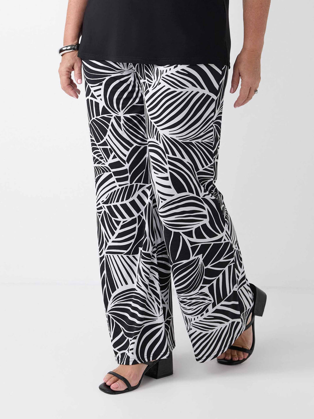 Black and white tropical leaf print wide-leg palazzo pants