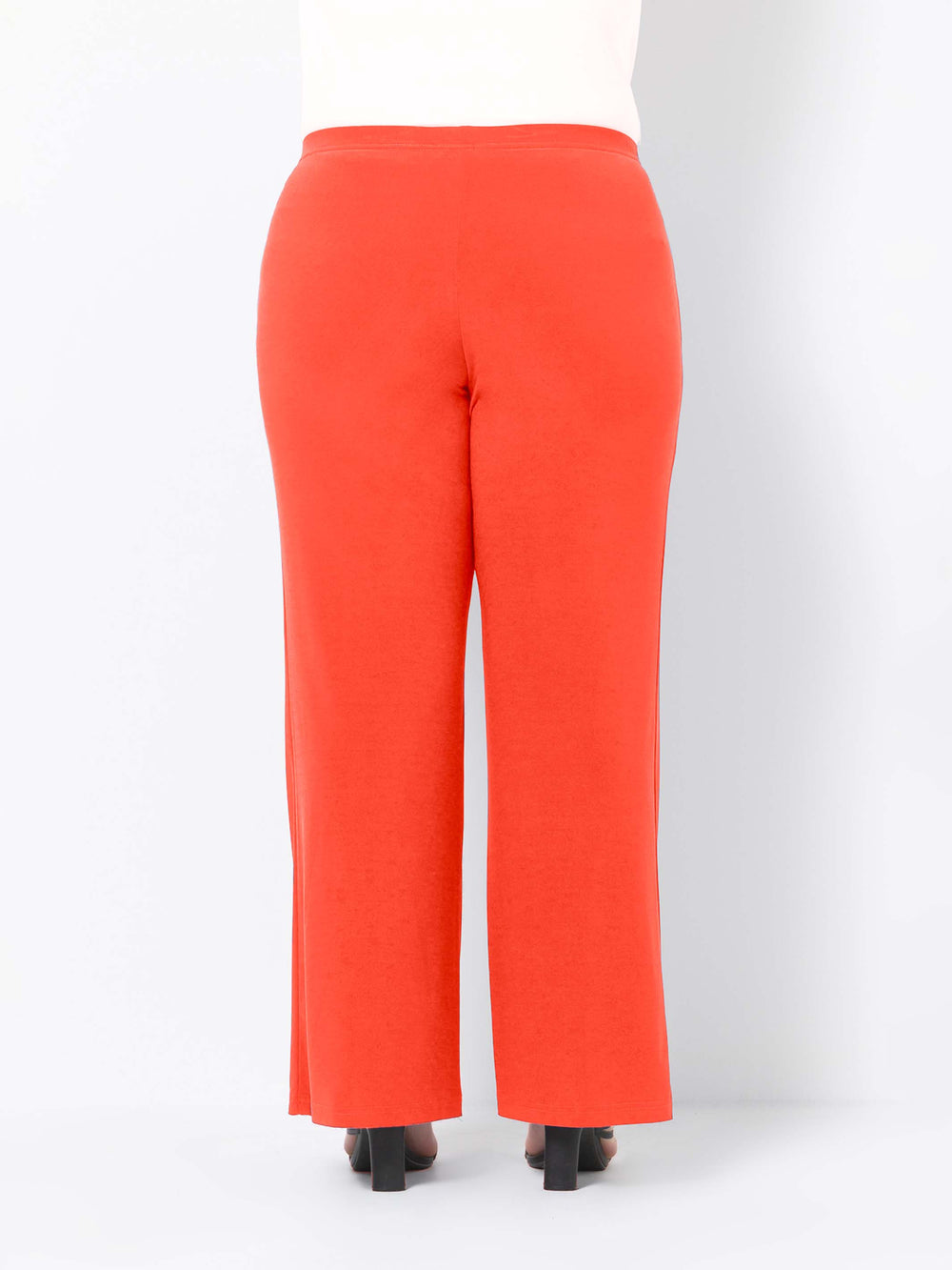 back view of bright orange wide-leg palazzo pants 