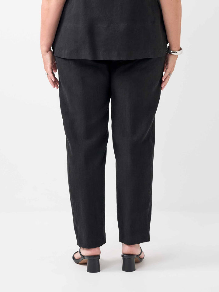back view of a black regular leg linen pant in full length