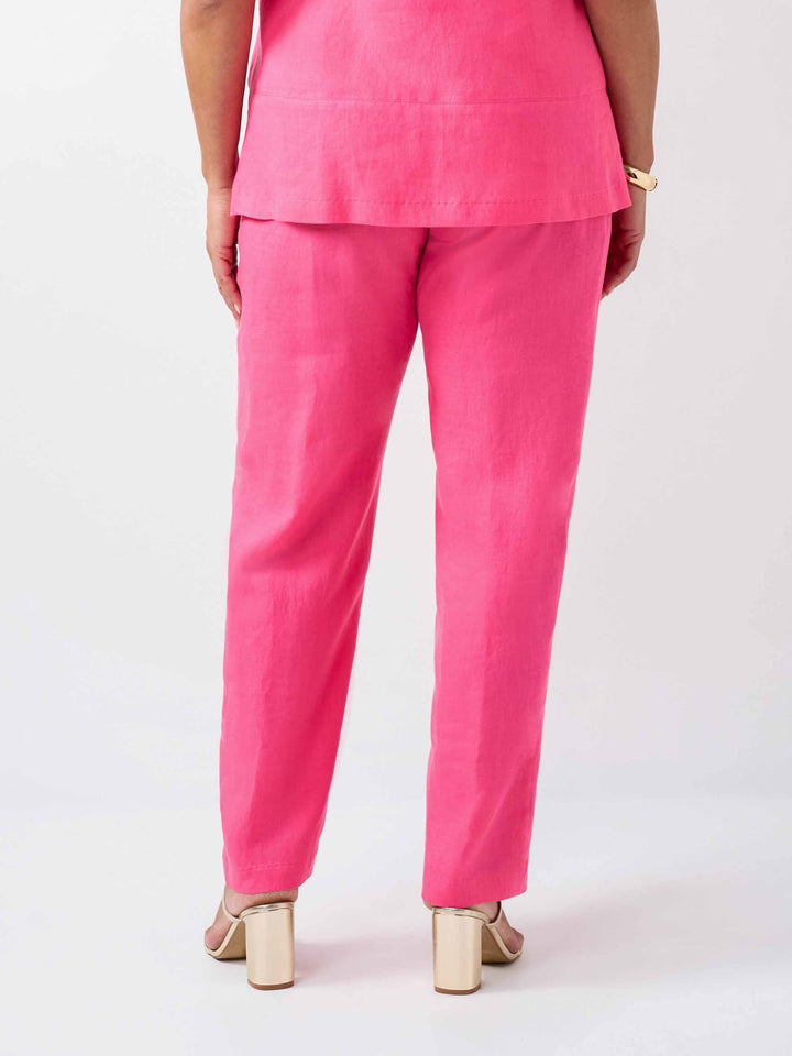 a back view of a plain linen full length straight leg pant in bright pink