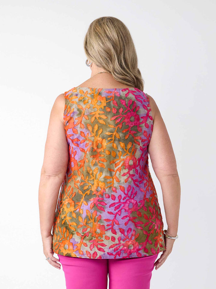A back view of a woman wearing a colourful burnout cami