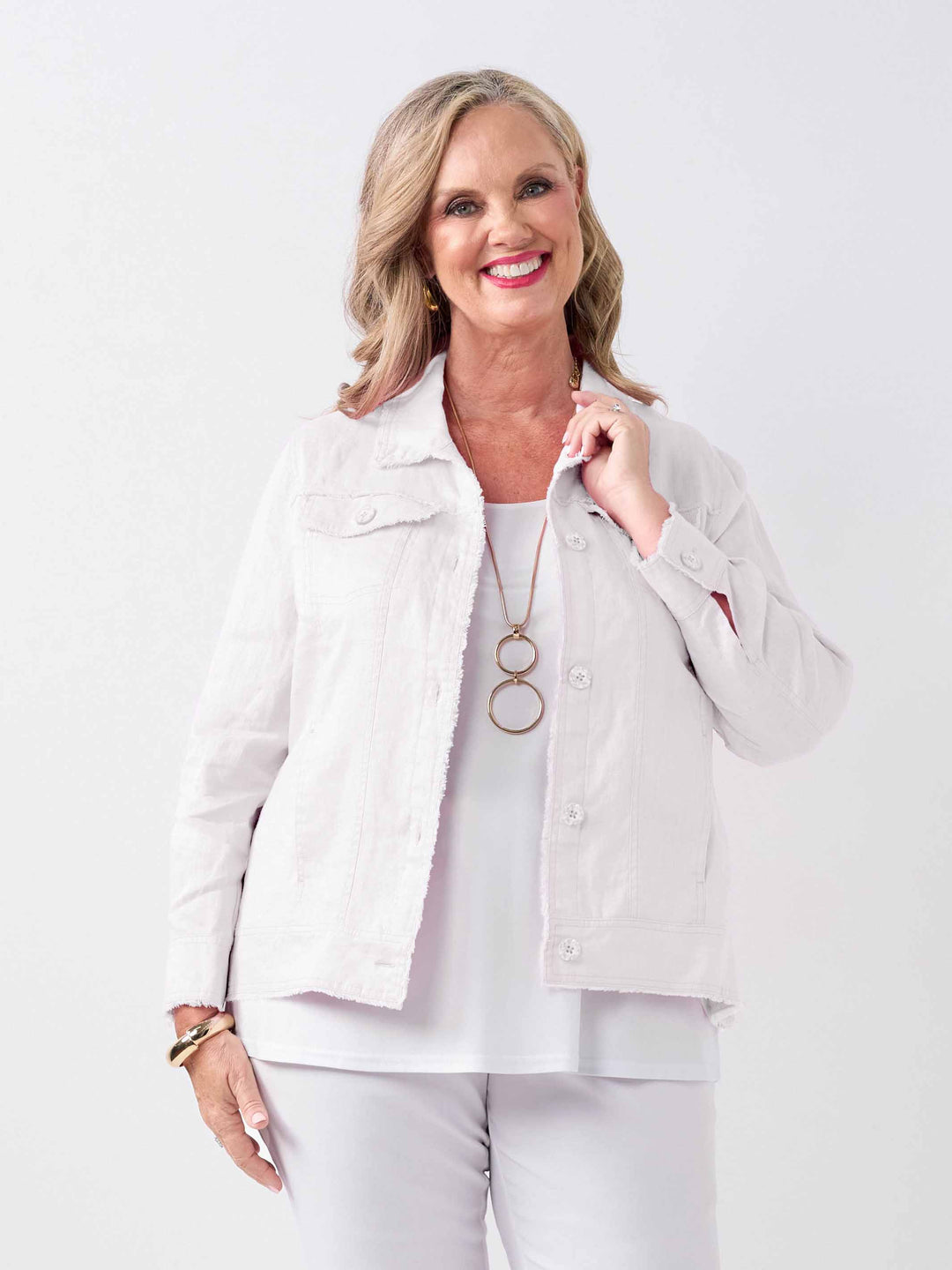 A woman wearing a lightweight everyday linen jacket