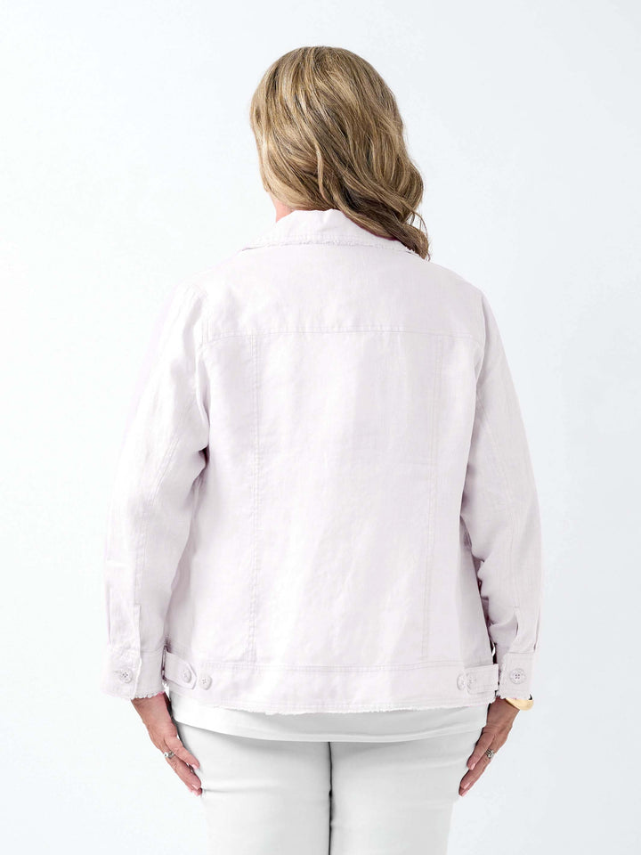 A back view of a woman wearing a lightweight everyday linen jacket