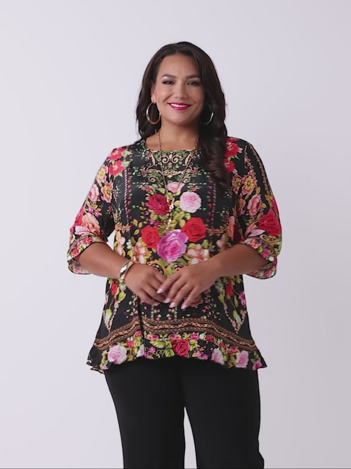 video showing plus size Jo jo print ruffle trim silky top - black on model