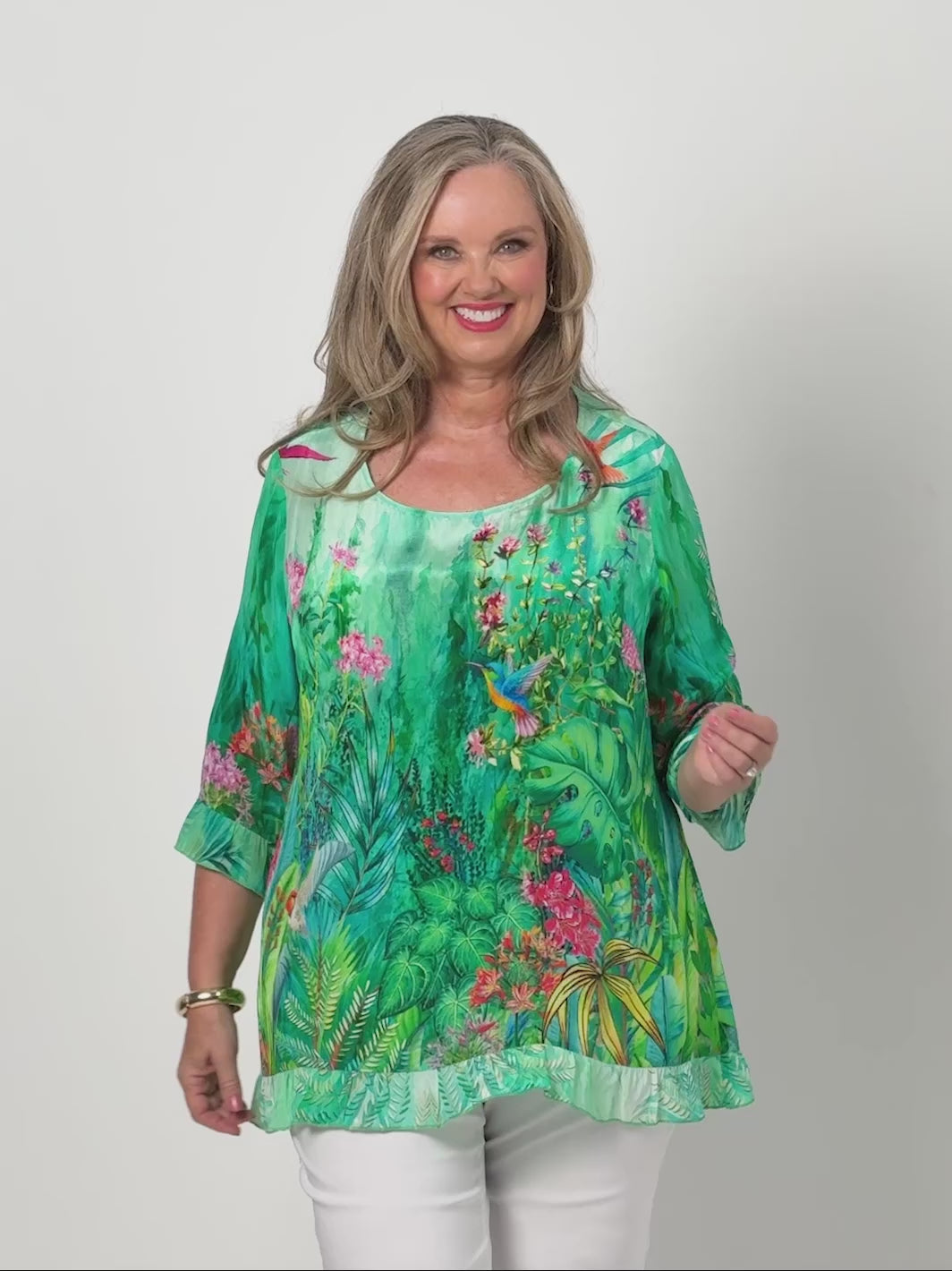 Video showing plus size Arabella print ruffle trim silky top - green on model