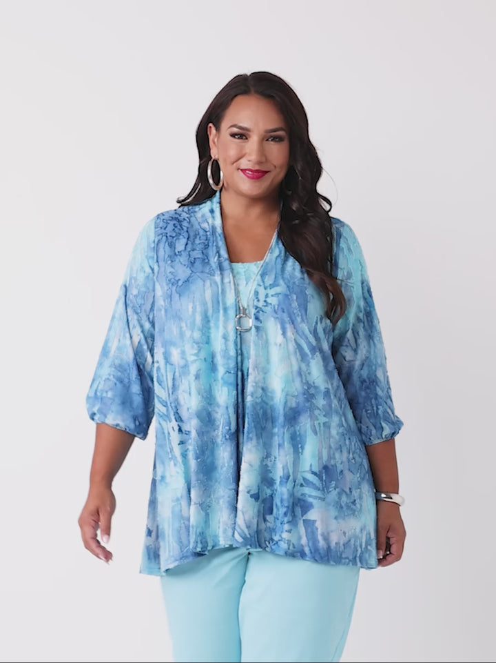 video of a woman wearing a blue tie-dye burnout jacket and cami set with three-quarter sleeves