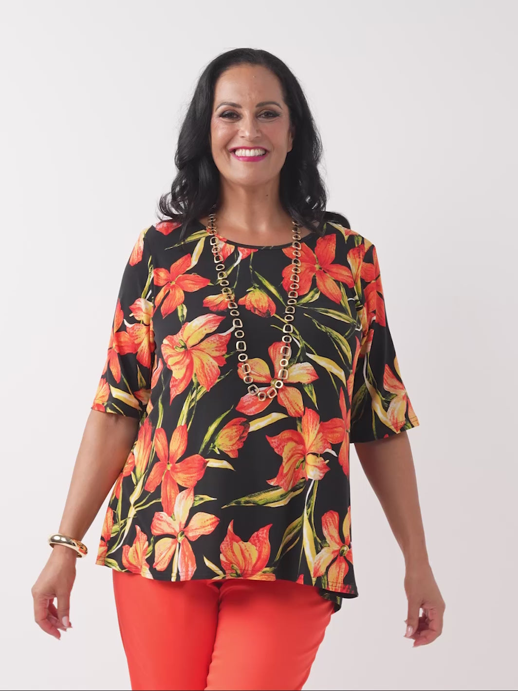 video showing sunburst day printed jersey top on model
