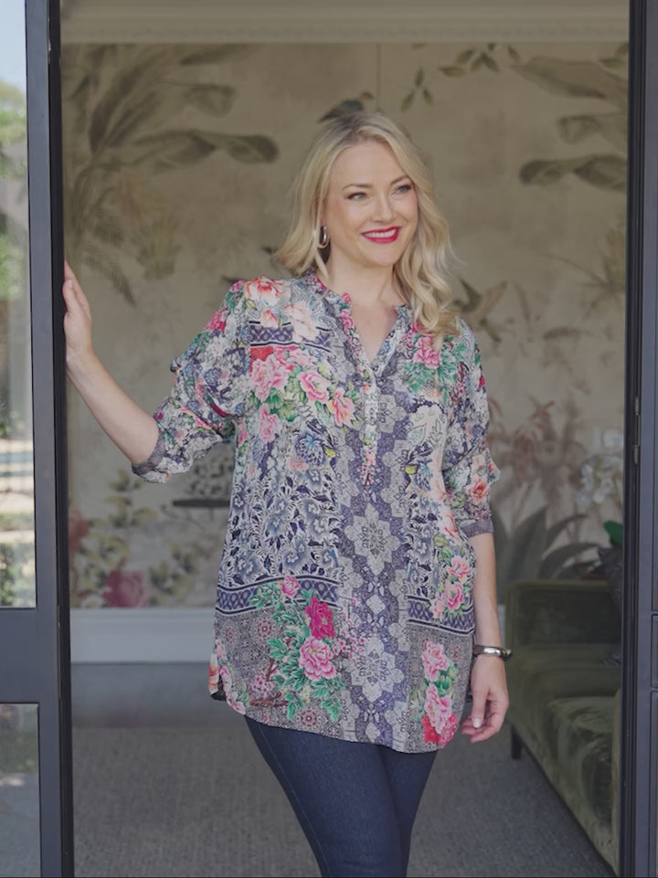 video showing Lydia floral print nehru collar silky top on model